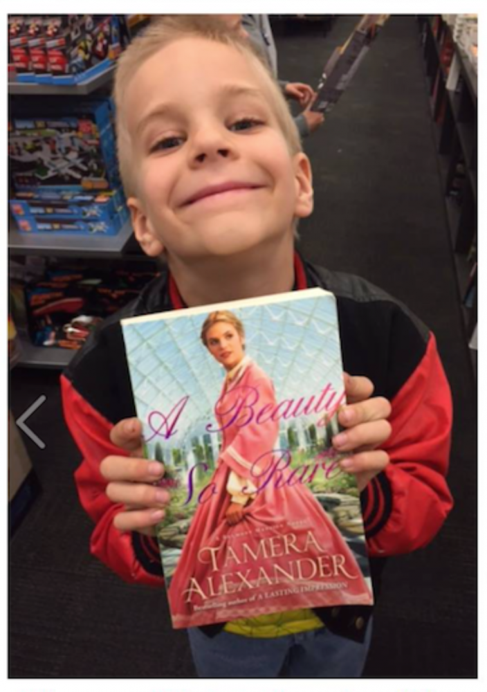 The precious son of Carl & Heather Cartee. They were out shopping, saw a copy of the book, and snapped a pic. Sweet!
