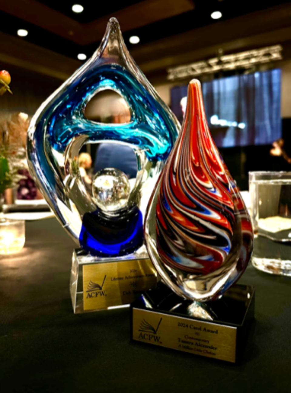 Tamera received the 2024 Carol Award for A Million Little Choices for Best Contemporary Fiction. Her Award is on the lower right. Pictured to the left is the lifetime achievement award that her writing critique partner for 20+ years received that same eve